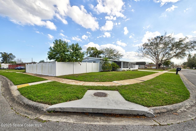 exterior space featuring a lawn