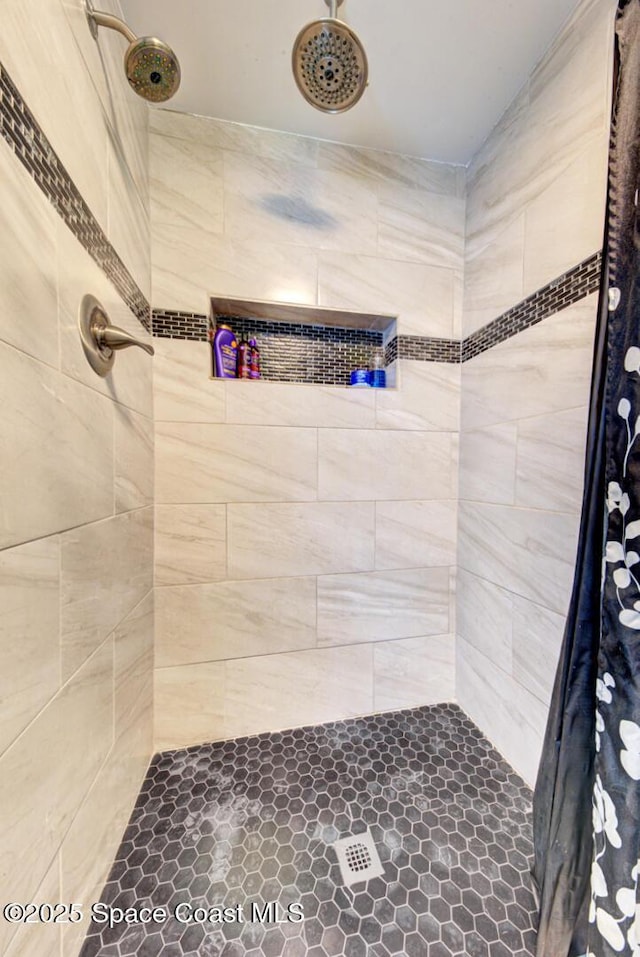 bathroom featuring curtained shower