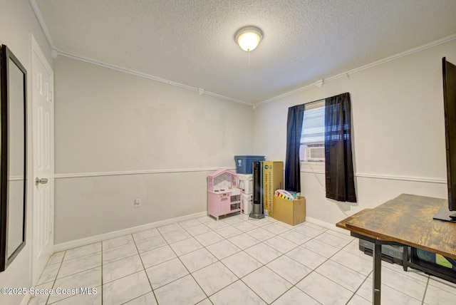 interior space with ornamental molding, cooling unit, and a textured ceiling