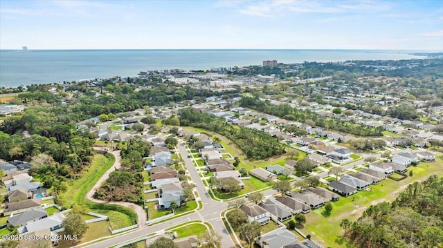 bird's eye view with a residential view and a water view