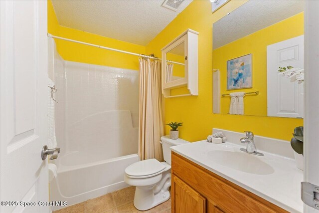 bathroom featuring visible vents, toilet, shower / tub combo with curtain, a textured ceiling, and vanity