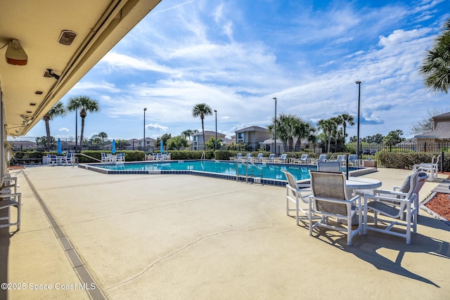 view of pool featuring a patio