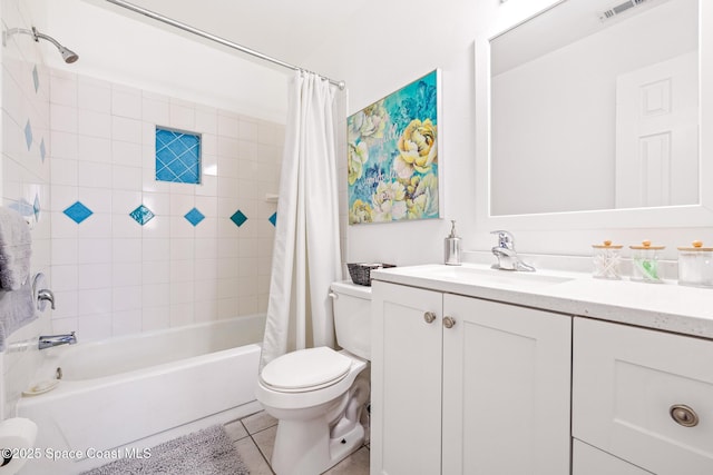 full bathroom featuring vanity, tile patterned floors, shower / bath combination with curtain, and toilet