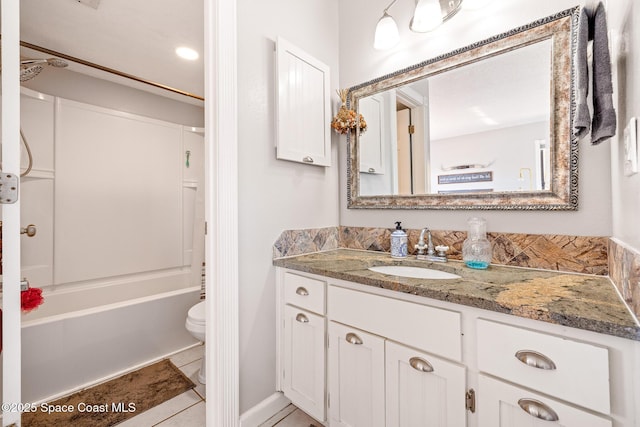 full bathroom with vanity, toilet, tub / shower combination, and tile patterned flooring