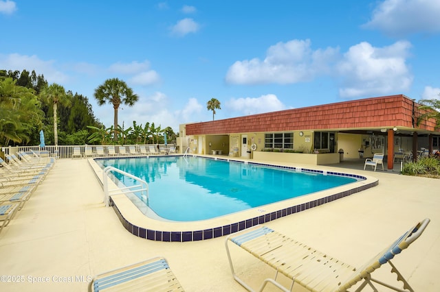 view of swimming pool featuring a patio