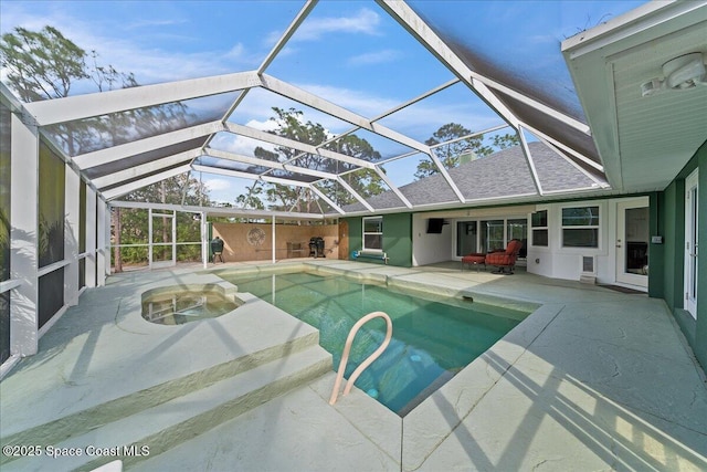 view of swimming pool featuring a patio and glass enclosure