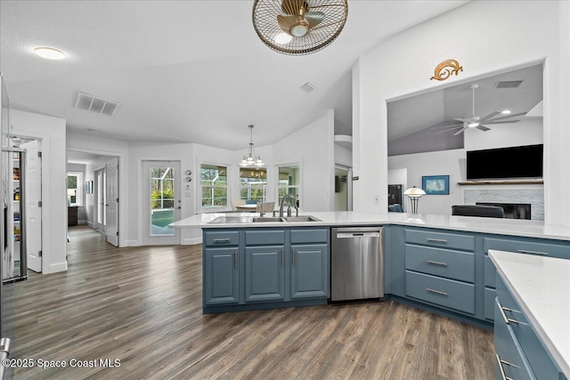 kitchen with dark hardwood / wood-style flooring, stainless steel dishwasher, ceiling fan, and decorative light fixtures