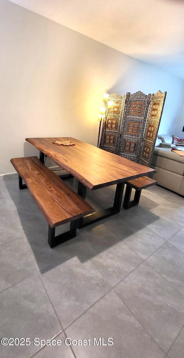 dining area featuring tile patterned floors