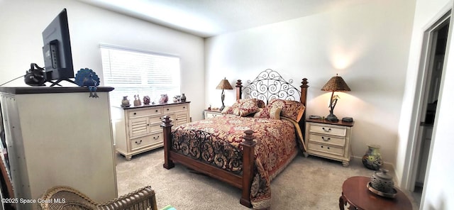 bedroom with light colored carpet