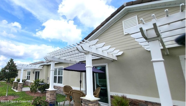 view of patio / terrace featuring a pergola