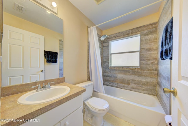 full bathroom featuring vanity, shower / tub combo with curtain, and toilet