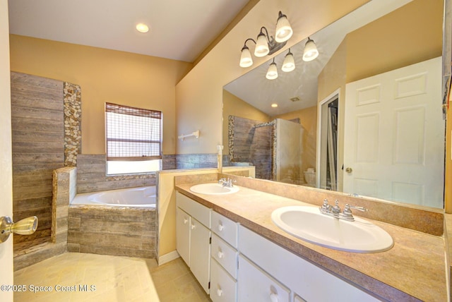 full bathroom with vanity, shower with separate bathtub, tile patterned floors, and toilet