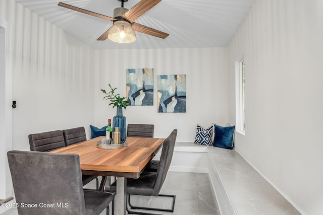 dining space with ceiling fan