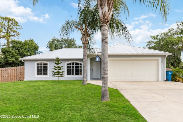 ranch-style home featuring a garage and a front yard