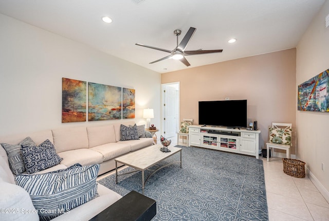 living room featuring light tile patterned floors and ceiling fan