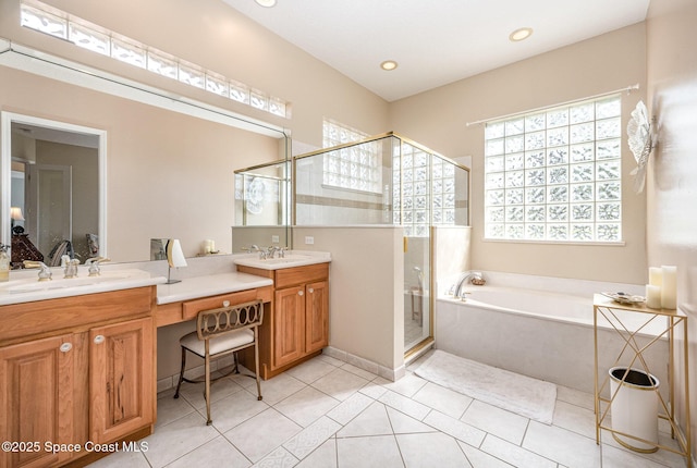 bathroom featuring tile patterned floors, plus walk in shower, and vanity