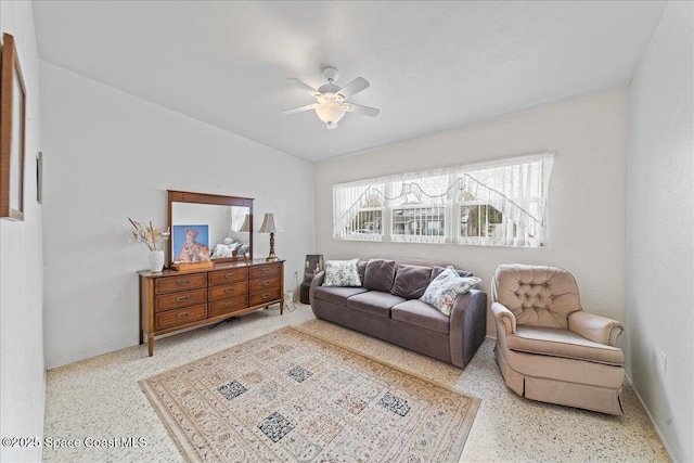 living room with ceiling fan