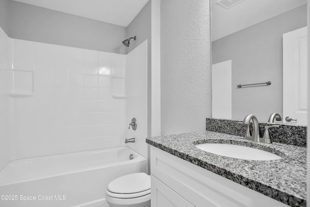 full bathroom featuring shower / tub combination, vanity, and toilet