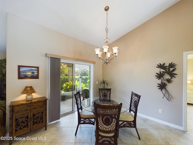 dining space with vaulted ceiling, light tile patterned flooring, and a chandelier