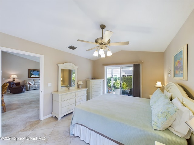 tiled bedroom with lofted ceiling and ceiling fan