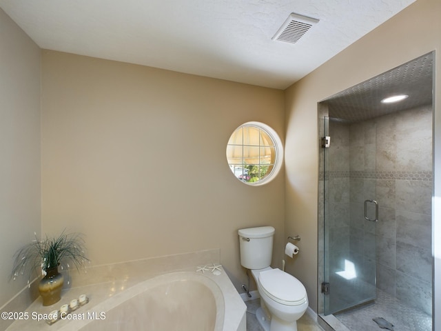 bathroom with toilet and plus walk in shower