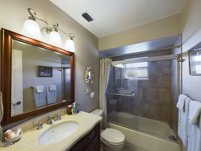 full bathroom with toilet, vanity, bath / shower combo with glass door, and a textured ceiling