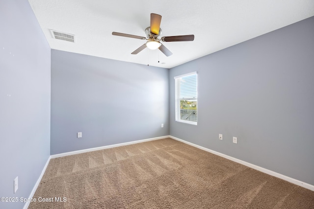 unfurnished room with carpet floors and ceiling fan