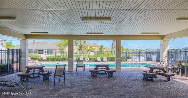 view of swimming pool featuring a patio