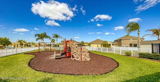 view of jungle gym with a yard