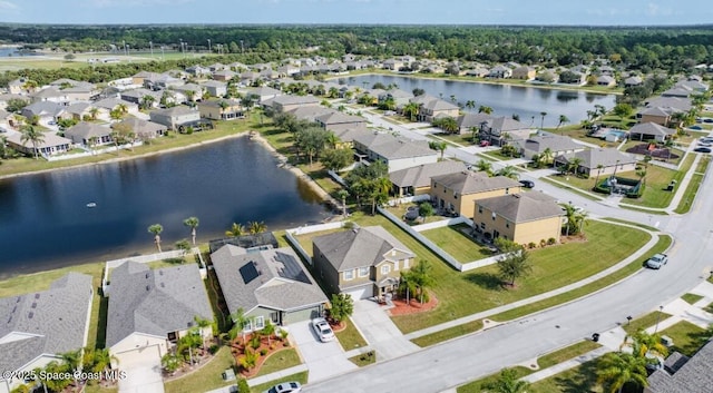 drone / aerial view featuring a water view