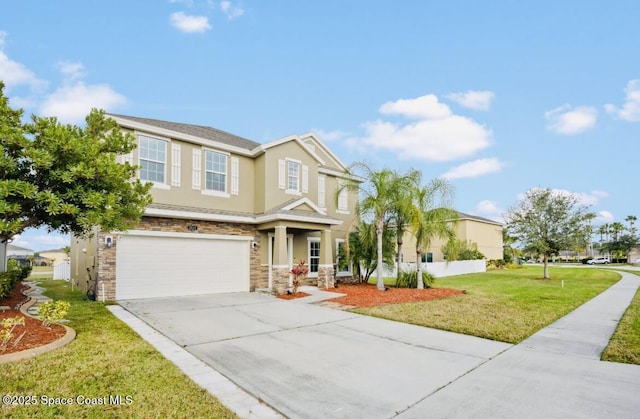 view of front of property featuring a garage and a front lawn