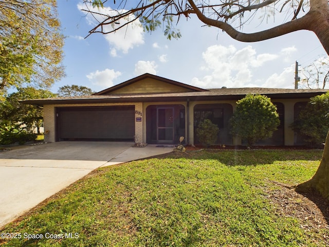 single story home with a garage and a front lawn