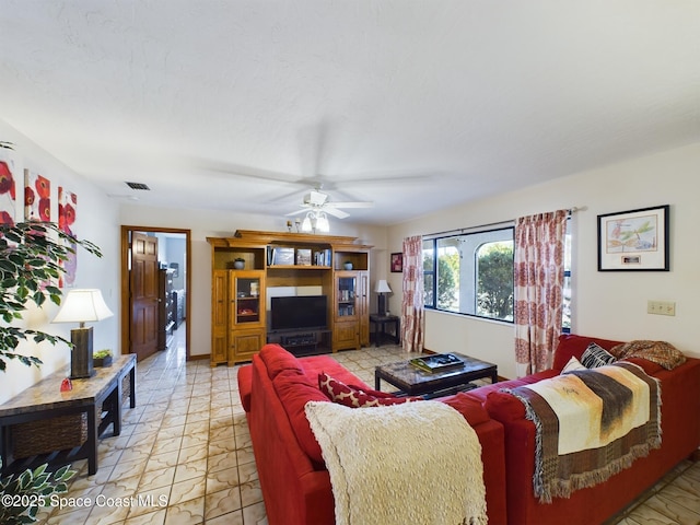 living room with ceiling fan