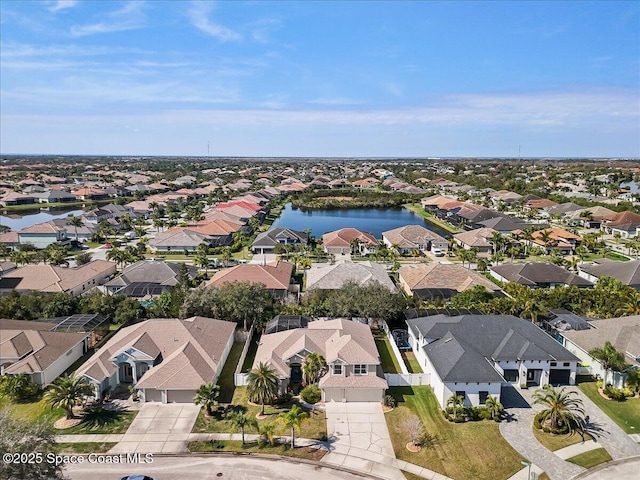 drone / aerial view featuring a water view