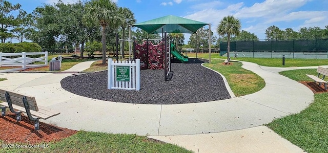 view of jungle gym featuring a yard