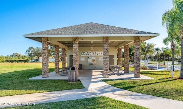 view of property's community featuring a gazebo and a lawn