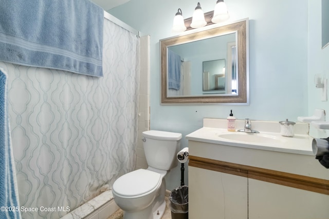 115 Carib Dr, Merritt Island, FL 32952 - bathroom featuring toilet, vanity, and a shower