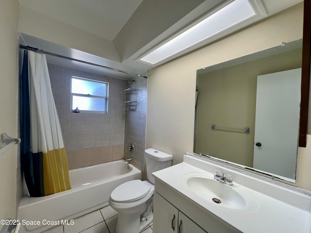 full bathroom with tile patterned floors, vanity, toilet, and shower / tub combo