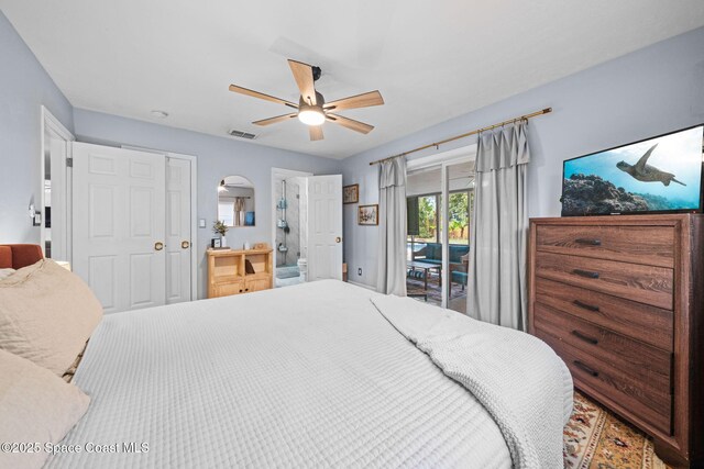 bedroom featuring ceiling fan, ensuite bathroom, a closet, and access to outside