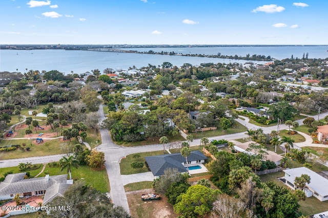 drone / aerial view featuring a water view