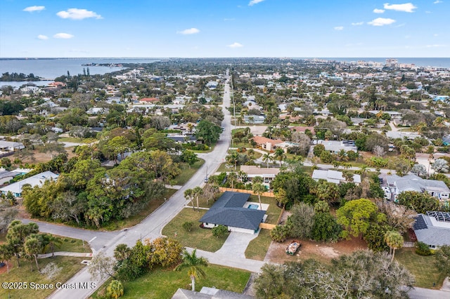 drone / aerial view with a water view