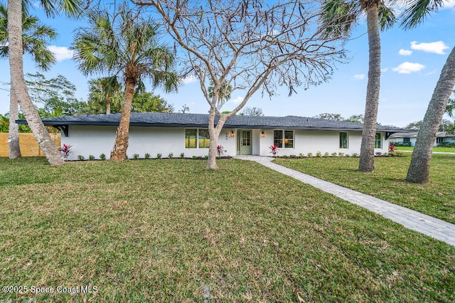 ranch-style house with a front yard