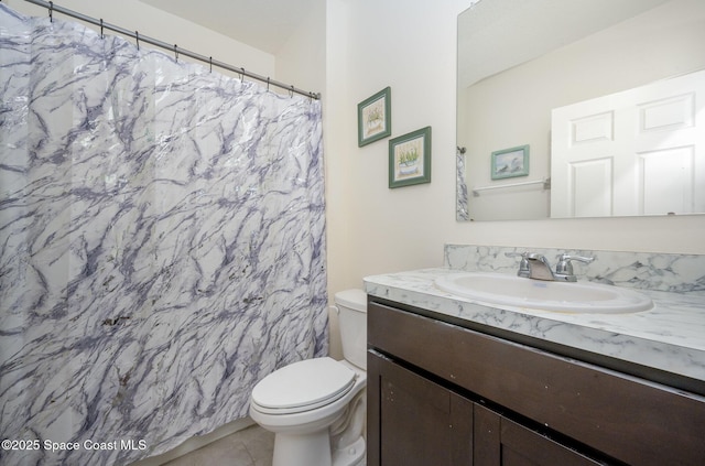 bathroom with tile patterned floors, vanity, toilet, and a shower with shower curtain