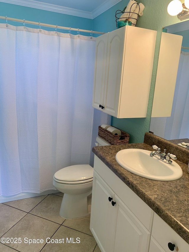 bathroom with tile patterned floors, toilet, crown molding, vanity, and a shower with shower curtain