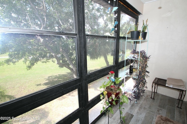 sunroom featuring a healthy amount of sunlight