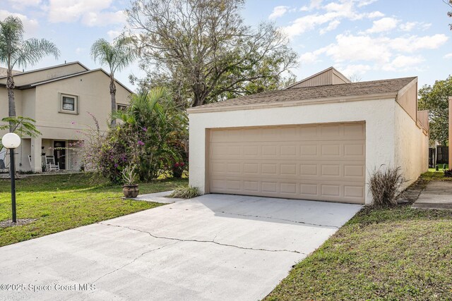 garage with a yard