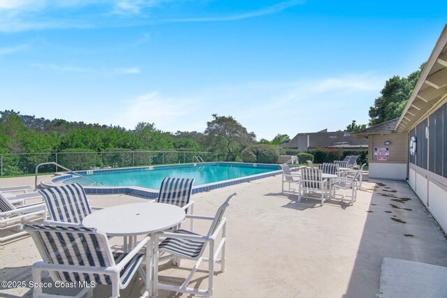 view of pool with a patio