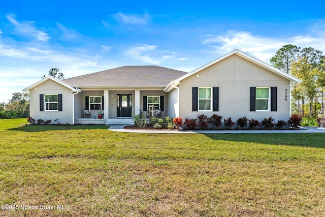 ranch-style home featuring a porch and a front lawn