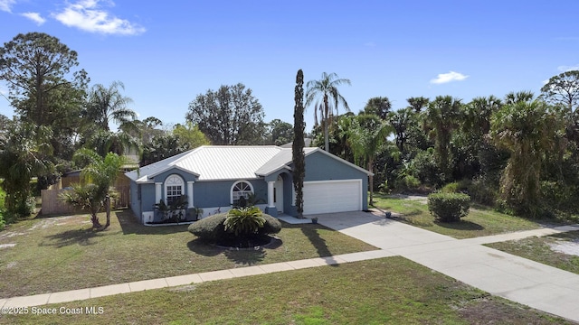 single story home with a garage and a front yard