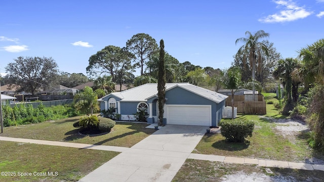 ranch-style house with a garage and a front yard